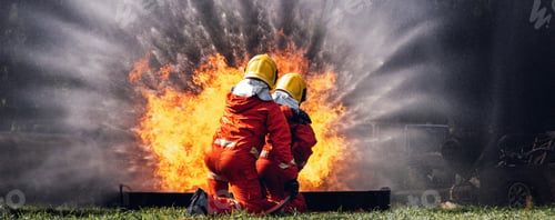 Preview: Firefighter Concept. Several firefighters go offensive for a fire attack.