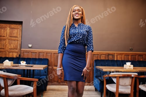 Preview: African woman in blue blouse