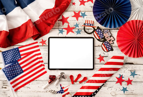 Preview: Digital tablet with white screen surrounded with independence day party elements top view flat lay