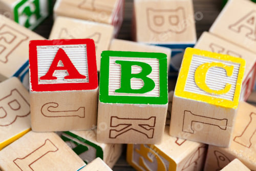 Preview: Alphabet blocks ABC on wooden table