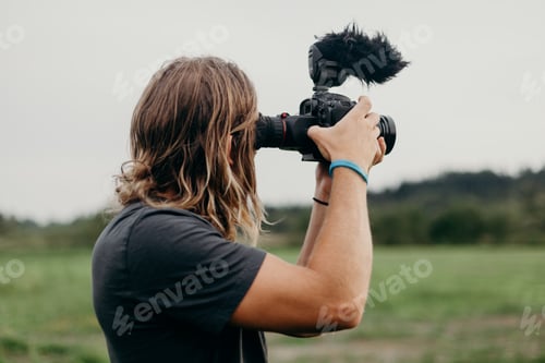Preview: Filmmaker with Camera in a Natural Setting