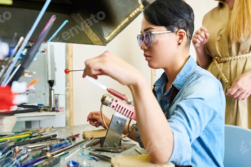Preview: Asian Female Artist in Glassworking Studio
