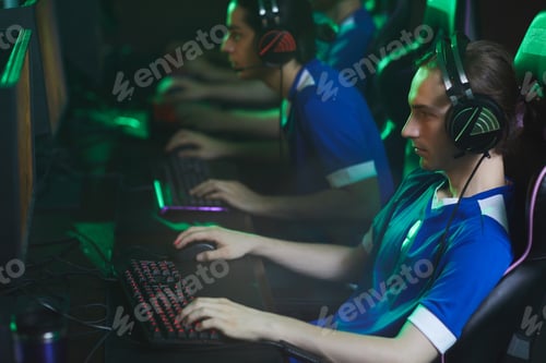 Preview: Focused cyber gamer in headset