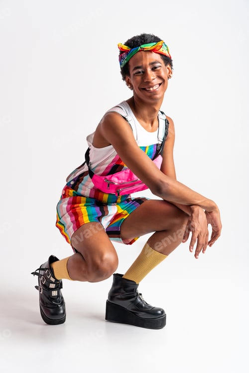 Preview: Fashionable fluid gender man posing in studio
