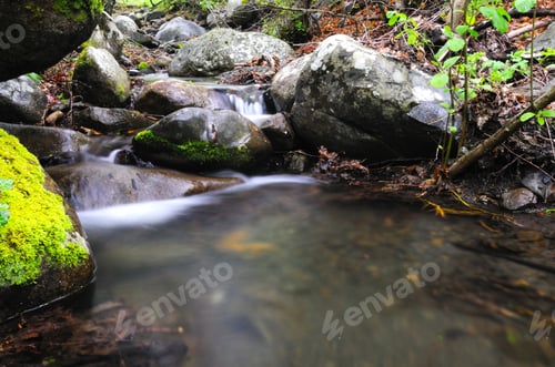 Preview: Stream with waterfall and mossy stones around