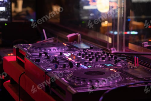Preview: Mixes on CD players or track at nightclub during party for DJ. Nightlife of disco club in pub bar