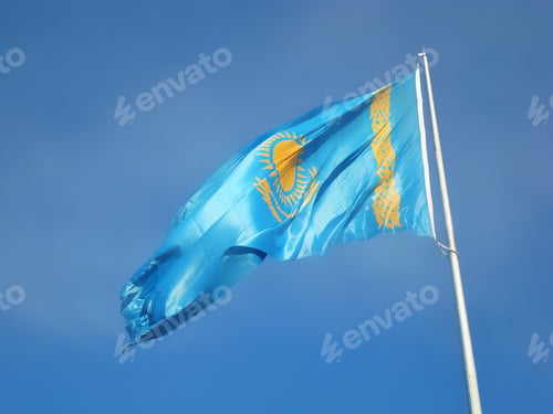Preview: flag of Republic of Kazakhstan on background of blue sky