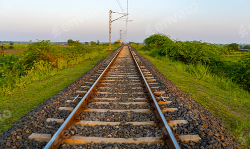 Preview: Landscape of railroad tracks in India cutting across rural countryside