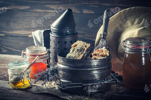 Preview: Age beekeeper tools with fresh and sweet honey