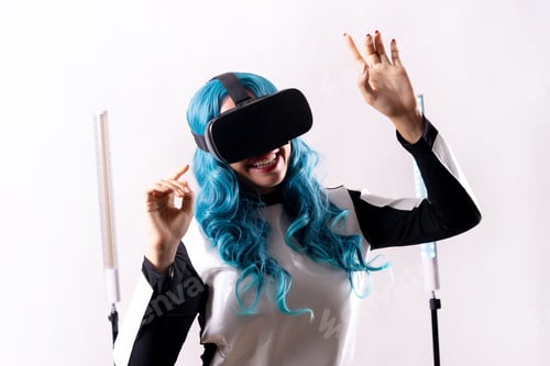 Preview: Female with blue hair and virtual reality glasses- a futuristic concept