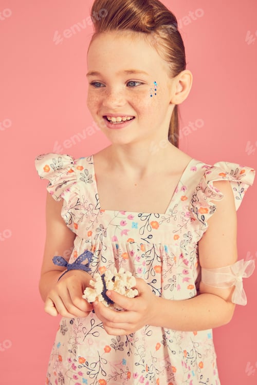 Preview: Young girl enjoying a sweet treat