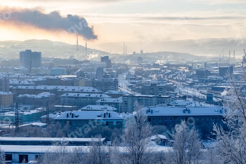 Preview: snowy Murmansk cityscape on cloudy winter evening