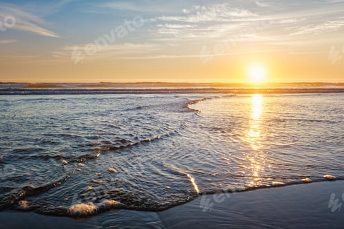 Preview: Atlantic ocean sunset with surging waves at Fonte da Telha beach, Portugal