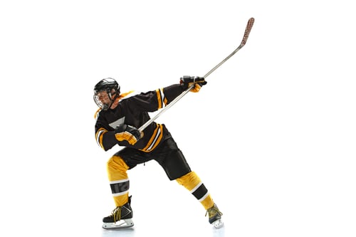 Preview: one caucasian man hockey player in studio silhouette isolated on white background