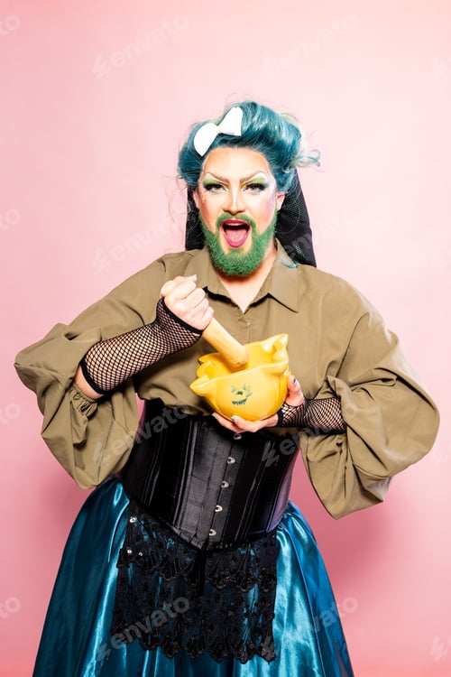 Preview: Drag Queen in Corset and Fishnet Gloves Preparing Ingredients in Mortar
