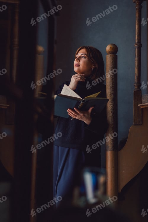 Preview: portrait of a beautiful girl with a book