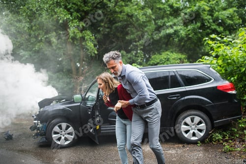 Preview: A mature man helping a young woman to walk after a car accident.