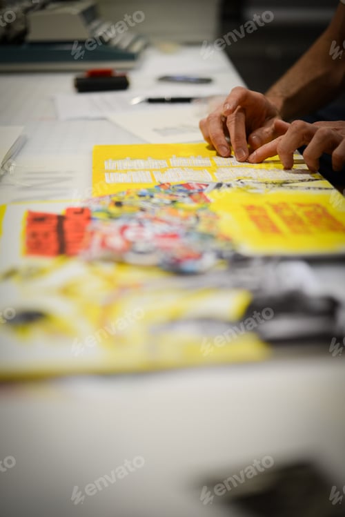 Preview: Creative space with designer hand creating print