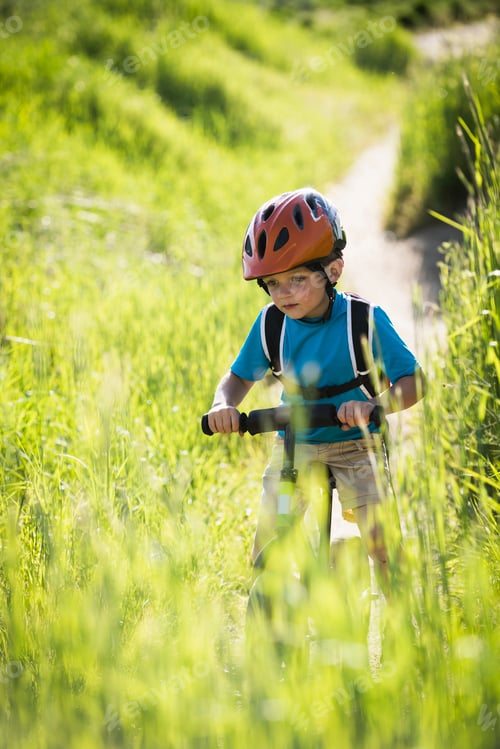 Preview: Boy cycling in park