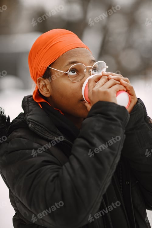 Preview: Portrait of young African American woman in the city