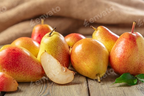 Preview: Ripe pears on rustic wooden table