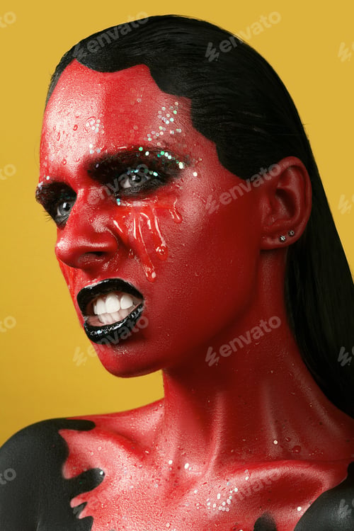 Preview: Fantastic Girl With Red Skin On A Yellow Background And White Teeth And Black Lips