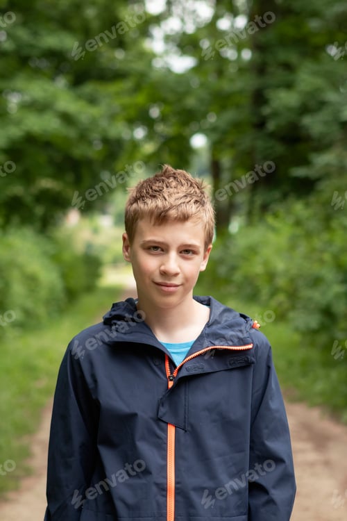Preview: portrait of a teenager boy in the summer in the village