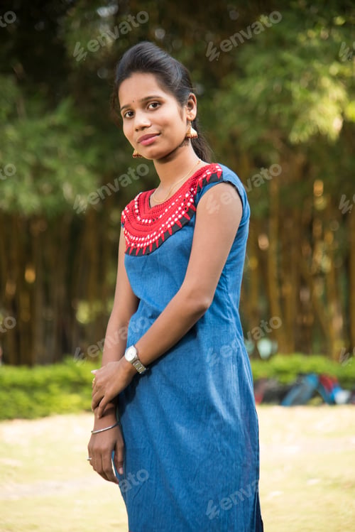 Preview: Outdoor portrait of beautiful young Indian girl in the park