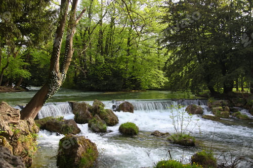 Preview: Small waterfall in green summer park