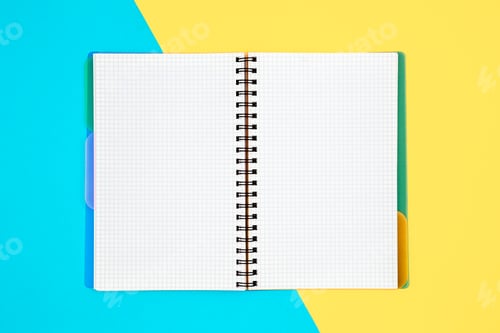 Preview: Open spiral notepad on blue yellow background, flat lay.
