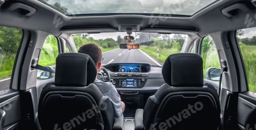 Preview: Driver on open road. Scenic countryside drive.