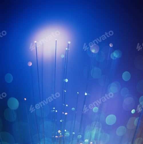 Preview: Glowing fiber optic strands with a bokeh effect in cool blue tones
