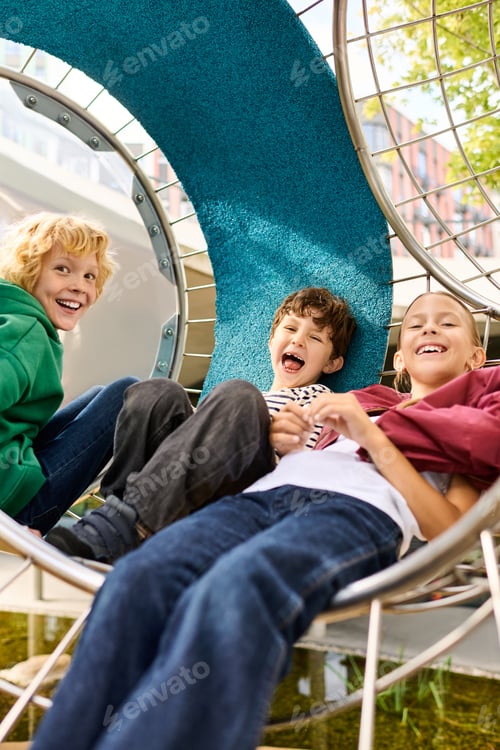 Preview: Joyful childhood moments in a colorful playground during autumn days