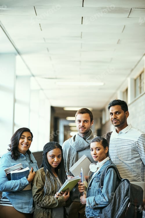 Preview: Cropped portrait of a group of university students standing in a campus corridor