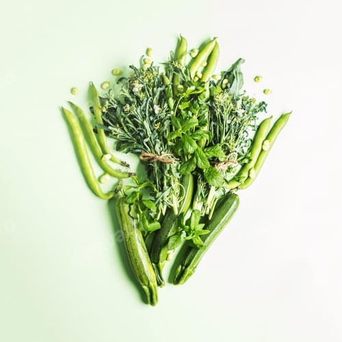 Preview: Green vegetables and herbs on mint pastel