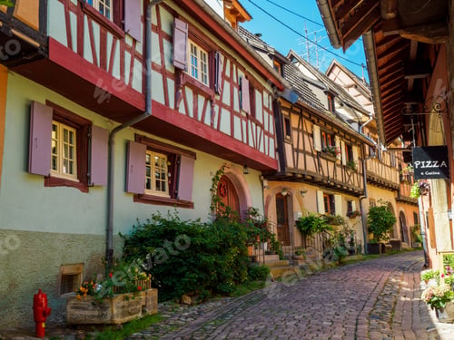 Preview: Street with colorful traditional french houses in Eguisheim, France