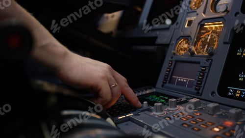 Preview: Panel of switches on an aircraft flight deck. Autopilot control element of an airliner. Pilot