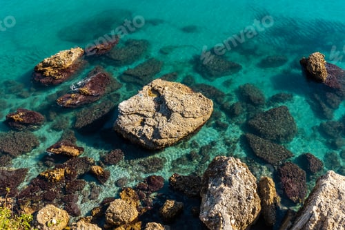 Preview: Detail of the sea and rocks on Calahonda beach in the town of Nerja, Andalucia