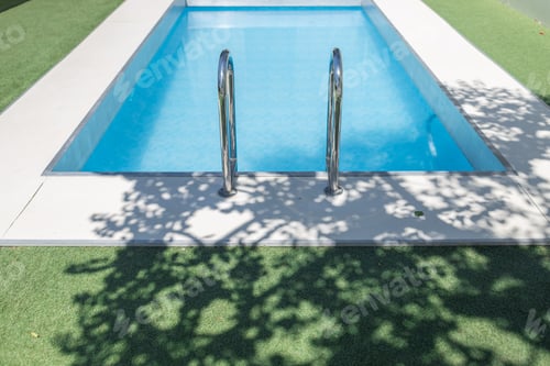 Preview: Swimming pool and chair in luxury villa. Luxury swimming pool in hotel resort with terrace on sunny