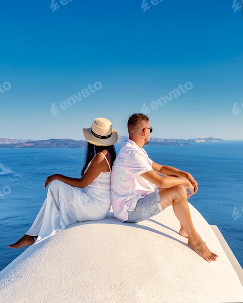 Preview: Couple of men and women on vacation in Santorini Greece, couple visit Oia Santorini