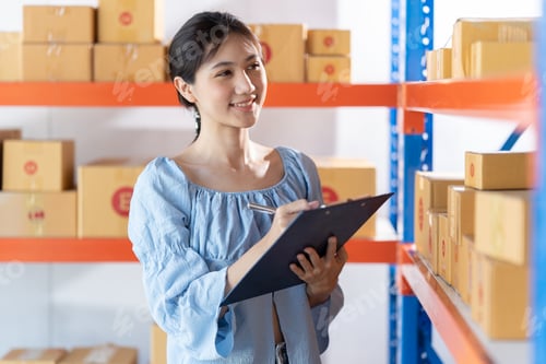 Preview: female entrepreneurs check online orders to prepare to pack the boxes, sell to customers,