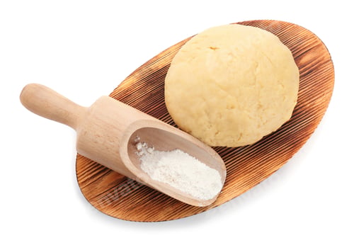 Preview: Wooden board with raw dough and scoop on white background, top view