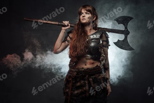 Preview: Holding two handed axe northern female warrior in dark background