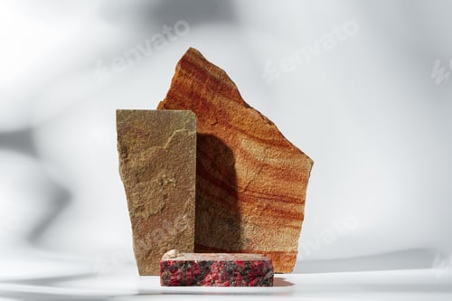 Preview: Piece of granite stone on white background with shadows