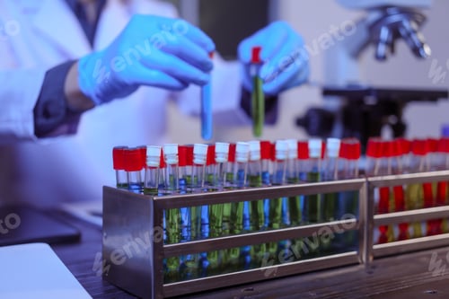 Preview: Close-up of a male scientist analyzing blood vessels in a modern laboratory. He is experimenting