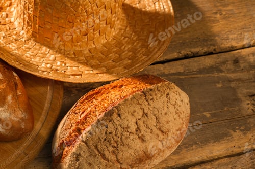 Preview: Artisan bread loaf on wooden background.
