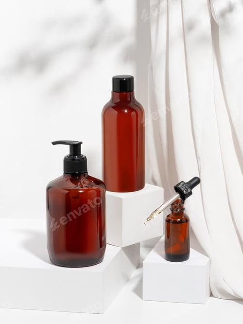 Preview: A set of care cosmetics for the body. Mockup template brown bottles shower gel, cream, massage oil