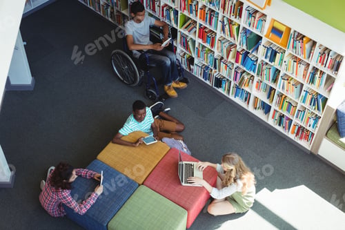 Preview: Attentive students studying in library