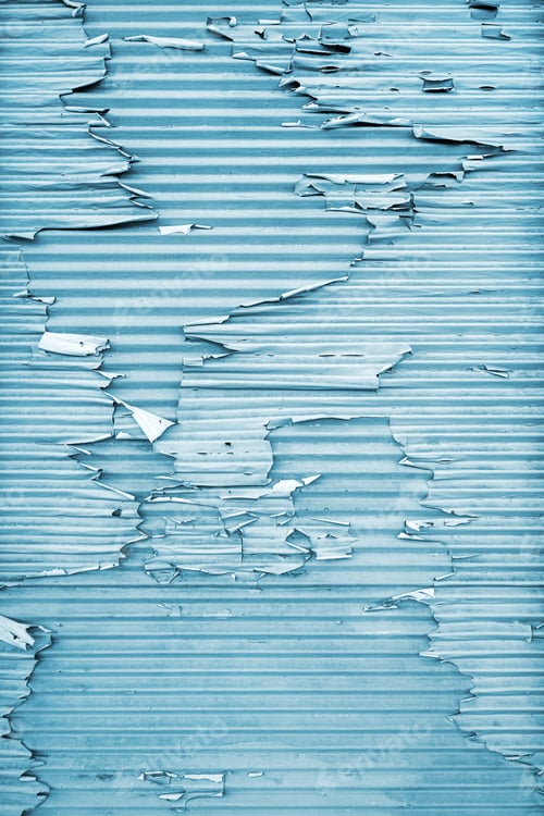 Preview: Grey paint peeling off the metallic corrugated surface as grunge background and texture