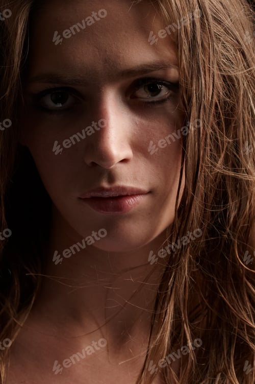 Preview: beautiful long hair brunette woman portrait, studio shot
